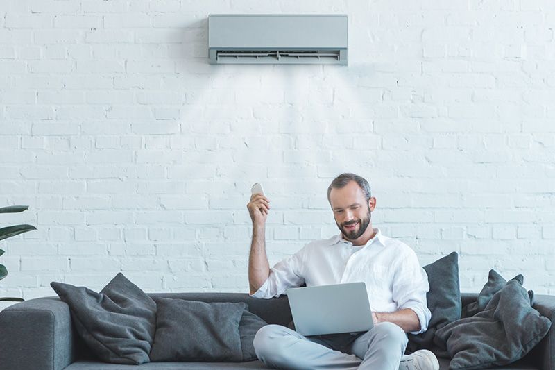 Video - 4 Amazing Benefits of Ductless Units - Divorced Man With Questionable Hairline Sits Under Ductless System Lonely and Broken.