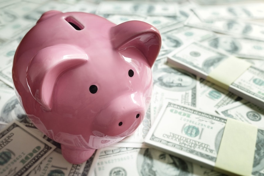 Piggy bank on money concept for business finance, investment, saving or retirement fund.